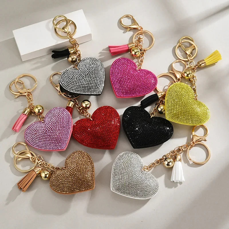 Full-rhinestone puffy heart bag charm with a leather tassel