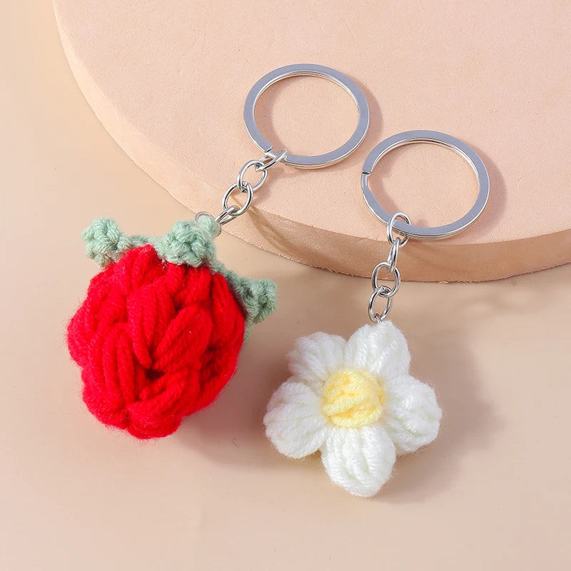 Hand-crocheted strawberry and daisy keychain