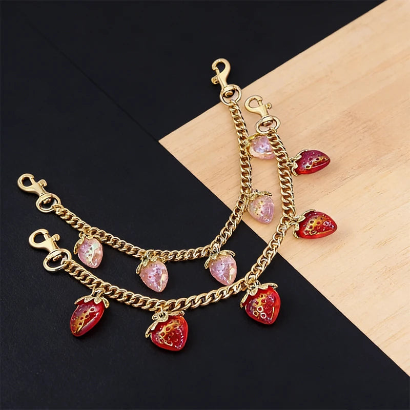 Gold-tone bag chain with strawberry and cherry charms