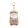 Plush otter holding a fish bag charm keychain