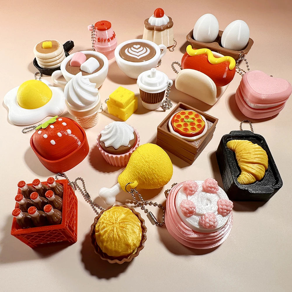 Food-shaped squishy fidget clicker charms on keyrings