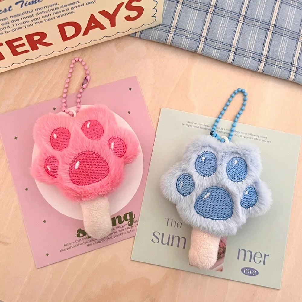 Plush cat-paw popsicle keychain with squishy toe beans
