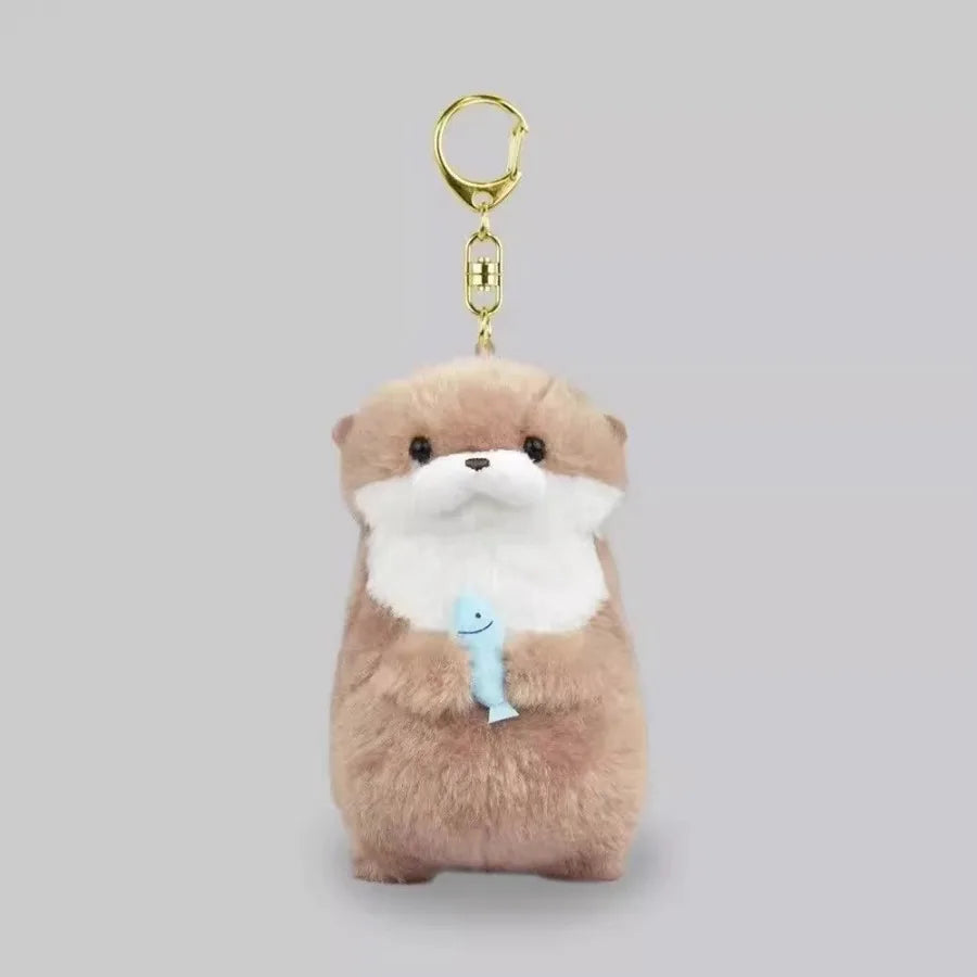 Otters Holding Fish Bag Charm